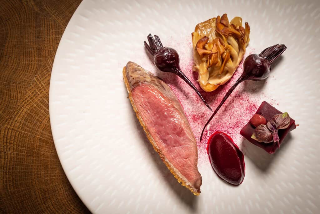 A white plate with food on it.