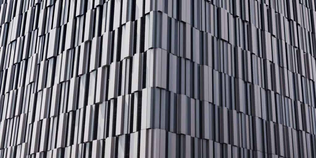 A close up of a building with a lot of squares on it.