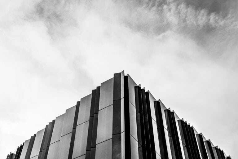 A black and white photo of an office building.