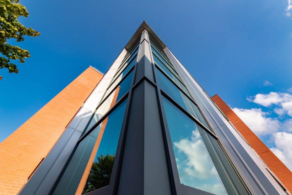 A tall building with a blue sky.