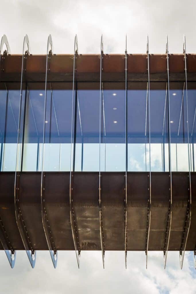 A metal structure with a view of the sky.