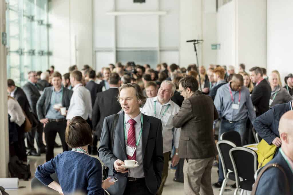 A crowd of people at a conference.